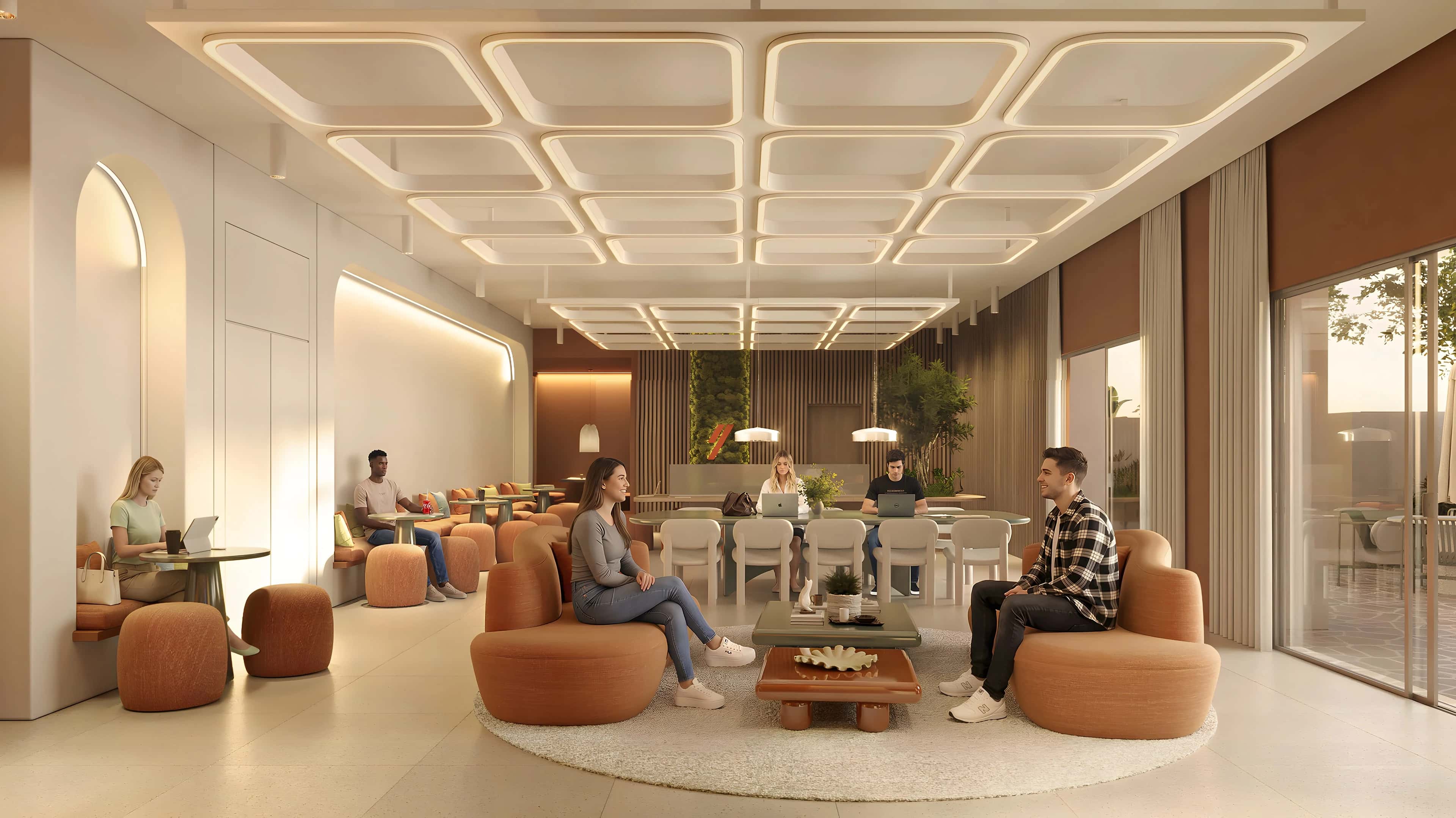 Espaço de convivência do Liv One com sofás e mesas