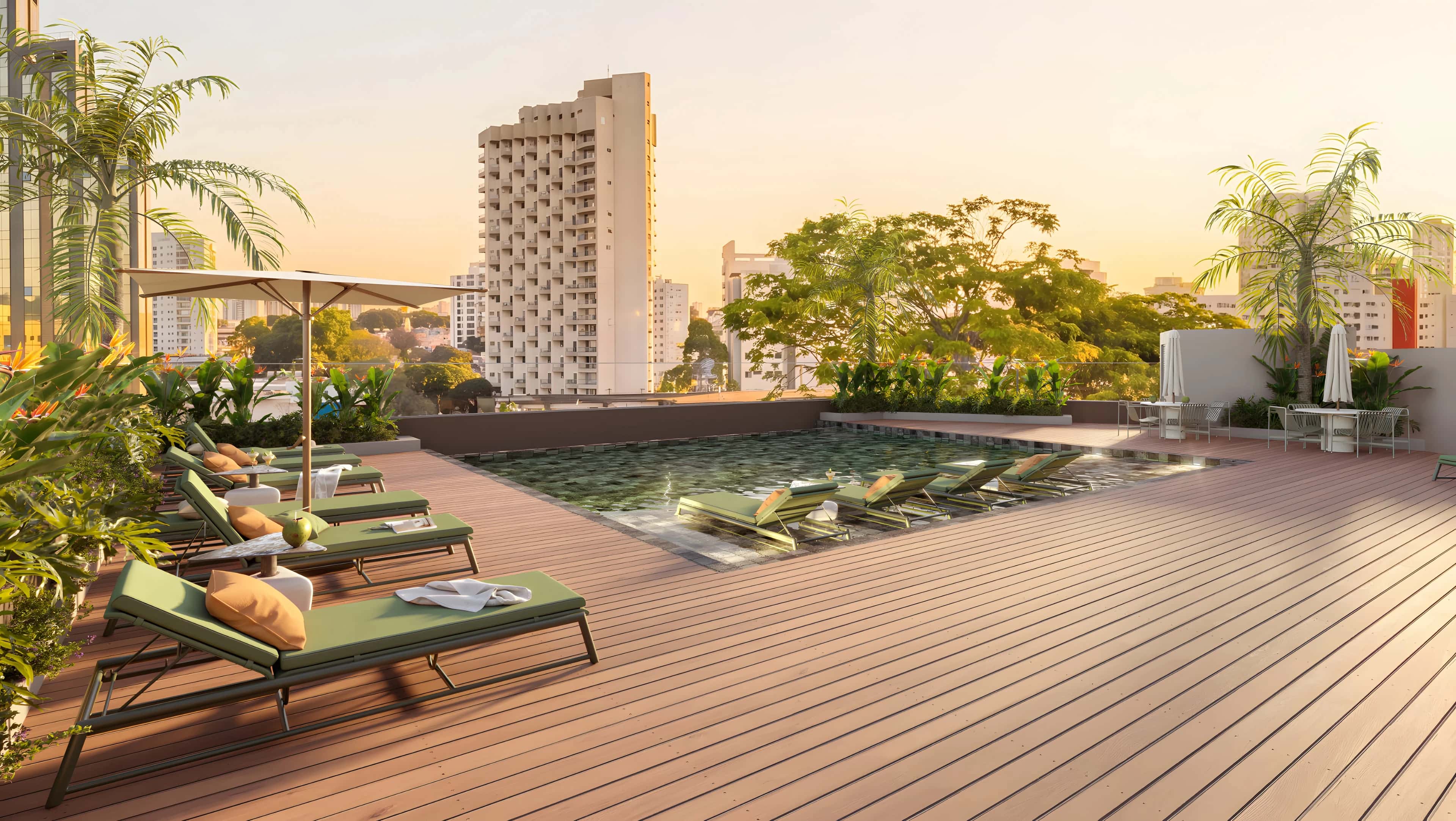 Piscina no rooftop do Liv One com deck e vista da cidade ao pôr do sol