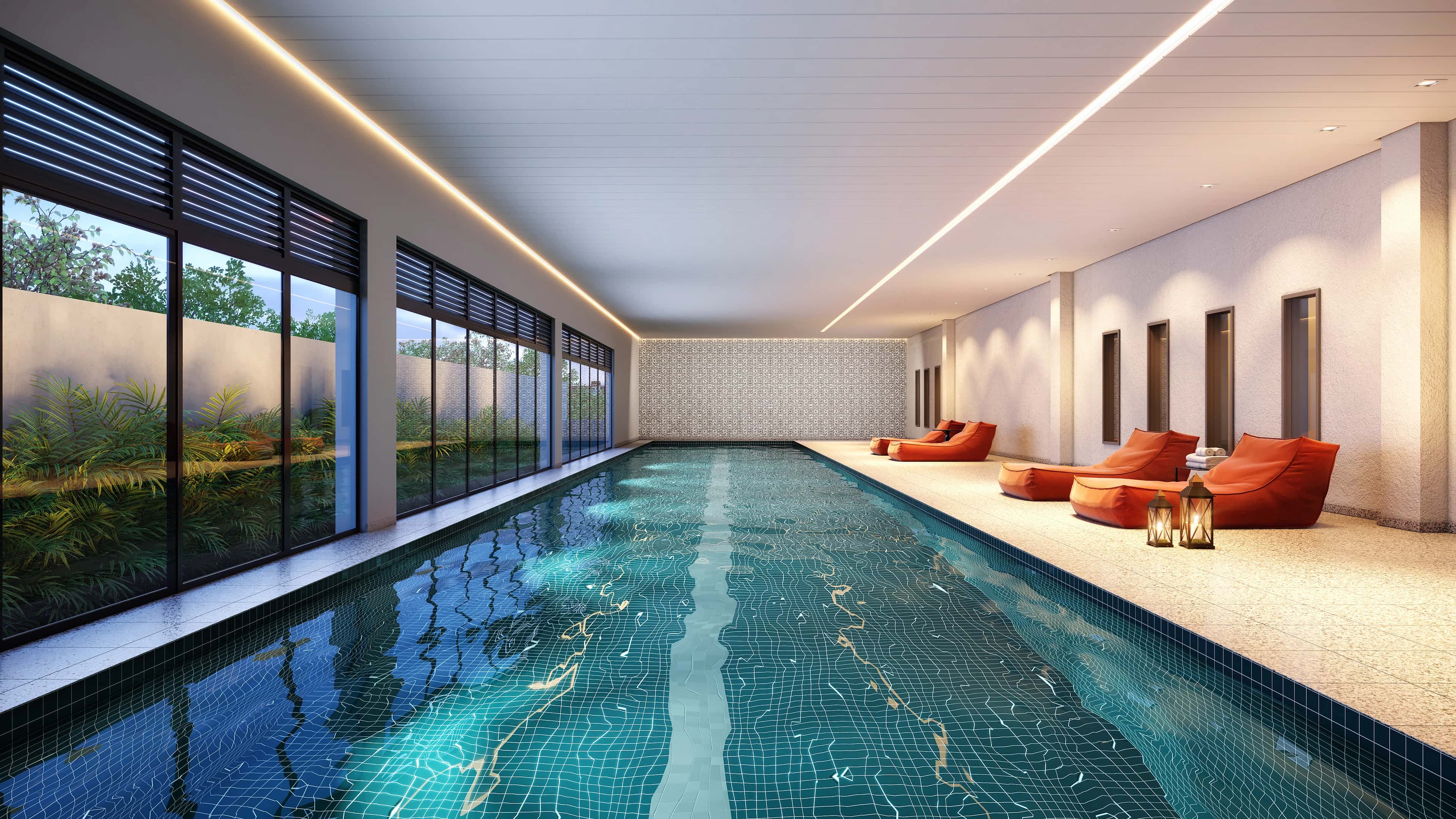 Piscina coberta e climatizada do Vision Colinas com raia longa e espreguiçadeiras